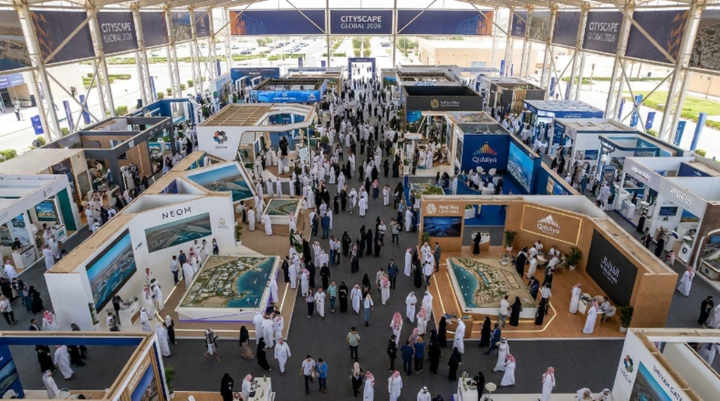 Aerial overview of Cityscape Global 2026 exhibition floor at Malham Riyadh with giga-project displays and thousands of attendees