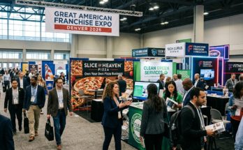Attendees exploring franchise booths at the Great American Franchise Expo Denver 2026 inside a large convention hall
